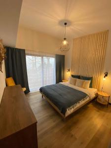 Giường trong phòng chung tại Chata Eliáš