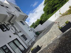 two white buildings next to each other at The Palms Property in Long Mountain