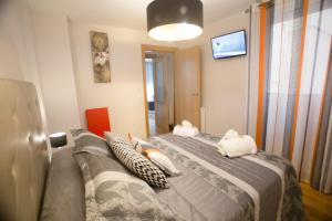 Postel nebo postele na pokoji v ubytování Apartamentos Amaiur