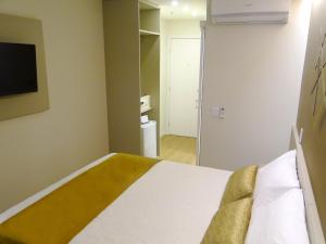 Postel nebo postele na pokoji v ubytování Easy Hotel Cachoeiro de Itapemirim by Atlantica