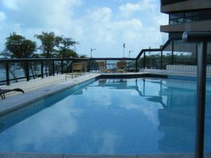 a swimming pool on the roof of a building at Fortaleza 703--Fortaleza 713 in Fortaleza
