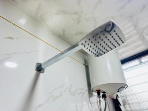 a security camera on the ceiling of a room at Sairam Residency in Ellora