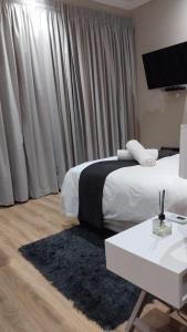 Postel nebo postele na pokoji v ubytování Mnembe Safari Game Reserve