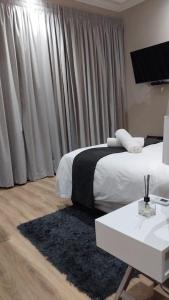 Postel nebo postele na pokoji v ubytování Mnembe Safari Game Reserve