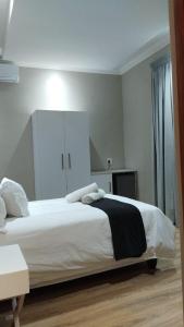 Postel nebo postele na pokoji v ubytování Mnembe Safari Game Reserve