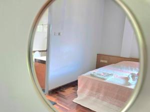 En eller flere senge i et værelse på H2 Banchang 08 + 3 billeder