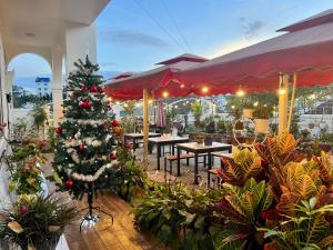 En restaurant eller et andet spisested på Homestay M-Latino Dalat