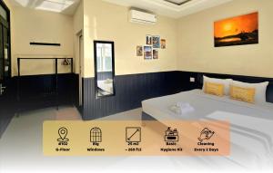 a hotel room with two beds and descriptions of the room at Flamingo Villa Hoi An in Hoi An