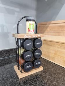 een wijnrek met een bos wijnflessen bij Bella Vista Ferienwohnung in Bürs