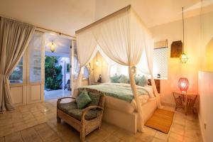 En eller flere senge i et værelse på Villa Bella Seseh, 3-Br With Private Pool