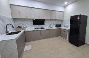 Køkken eller tekøkken på Hatasan Homestay Guess House"陽光親子民宿"