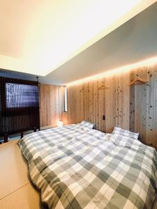 En eller flere senge i et værelse på Peanuts Nest