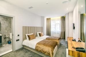 En eller flere senge i et værelse på GREEN PARK HOTEl + 40 billeder