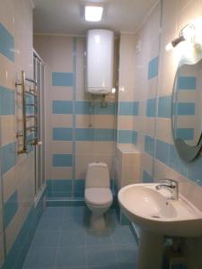 Phòng tắm tại Hotel Zodiak