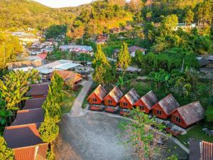 an aerial view of a village with red houses at ภูชี้ฟ้าอินน์ รีสอร์ท Phucheefainn Resort in Ban Seng Choi
