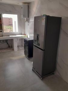 Nhà bếp/bếp nhỏ tại Port View Luxury Apartment Escacle Ziguinchor