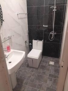 Phòng tắm tại Port View Luxury Apartment Escacle Ziguinchor +7 ảnh