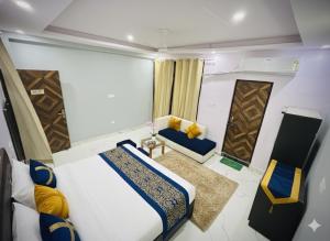 En eller flere senge i et værelse på Hotel regal garden