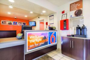 a fast food restaurant with a sign on the counter at Motel 6-Chino, CA - Los Angeles Area in Chino