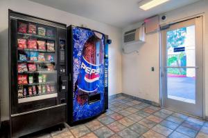 a pepsi soda machine in a room at Motel 6-Chino, CA - Los Angeles Area in Chino