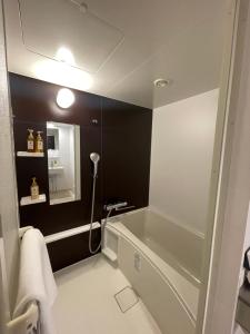 Koupelna v ubytování Hopetree OSAKA GRAND + 8 fotografií