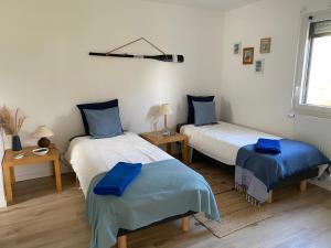 En eller flere senge i et værelse på maison 9 personnes, 4 chambres,pacé,10mn de Rennes