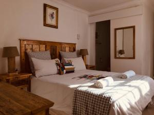 En eller flere senge i et værelse på MELJAA GROUP Guesthouse + 9 billeder