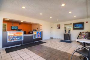 a waiting area of a fast food restaurant with a counter at Motel 6-Las Vegas, NV - I-15 Stadium in Las Vegas