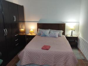 En eller flere senge i et værelse på Palermo Candombe House