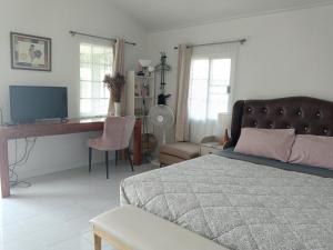 Postel nebo postele na pokoji v ubytování The Green Vale B&B