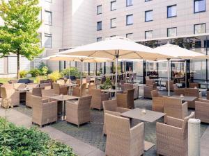 Khu vực ghế ngồi tại Mercure Hotel Düsseldorf City Nord