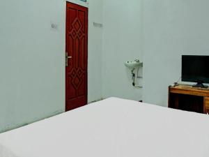 TV a/nebo společenská místnost v ubytování Hotel O Kost Axcel + 82 fotografií