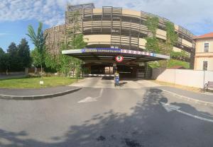 a building with a fire hydrant in front of it at ROYAL Experience at Stern Palace- Ultracentral și comfortabil in Oradea