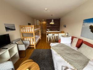 Et opholdsområde på New Gudauri Redco Premium Apartments