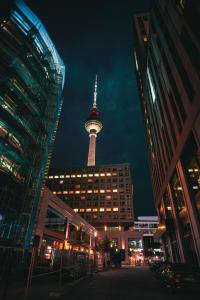 a view of the berlin tv tower at night at Hotel Indigo Berlin - East Side Gallery in Berlin