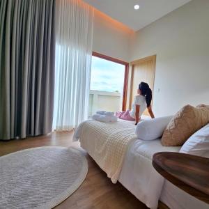 Postel nebo postele na pokoji v ubytování Villa 88 By KANNARA