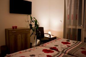 Postel nebo postele na pokoji v ubytování Motel Görföl + 7 fotografií