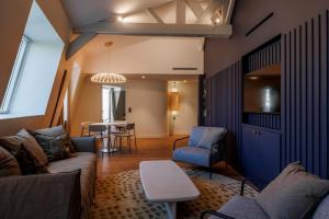 Et opholdsområde på Grand Hotel de Courtoisville