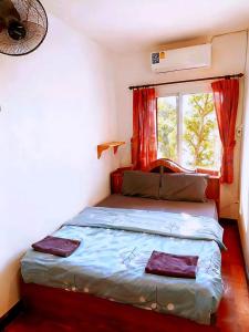 Postel nebo postele na pokoji v ubytování KingSun HOSTEL 金珊旅馆 + 19 fotografií