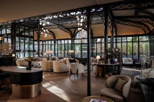 En restaurant eller et andet spisested på Grand Hotel de Courtoisville