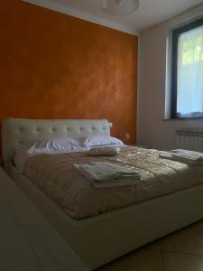 En eller flere senge i et værelse på Aurora's House