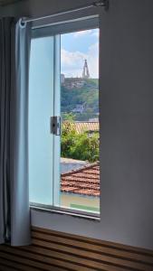 Photo de la galerie de l'établissement Pousada Passos de Fé, à Aparecida