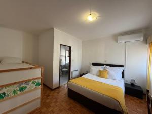 Postel nebo postele na pokoji v ubytování Gerês Guest House