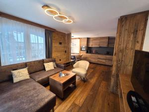 Et opholdsområde på La Perle Apartments