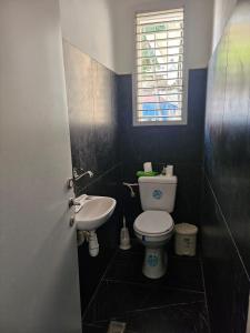 a bathroom with a toilet and a sink at Ocean view apart in Tel Aviv