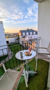 En balkon eller terrasse på Appartement de charme