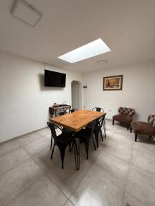 TV a/nebo společenská místnost v ubytování Cabañas "El Ancla"