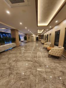 Posezení v ubytování TOROS BULVAR Cozy fancy Sea view next to the Mall and near to the Beach, in the mid of Alanya Mahmutlar! + 29 fotografií