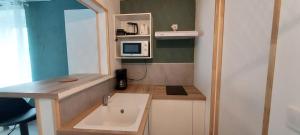 Køkken eller tekøkken på Les Bulles, Studio Balneo