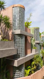 an architectural rendering of a building with plants at Patha Canggu in Canggu